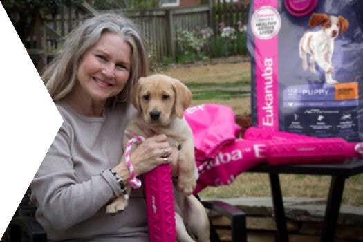 Woman holding her dog